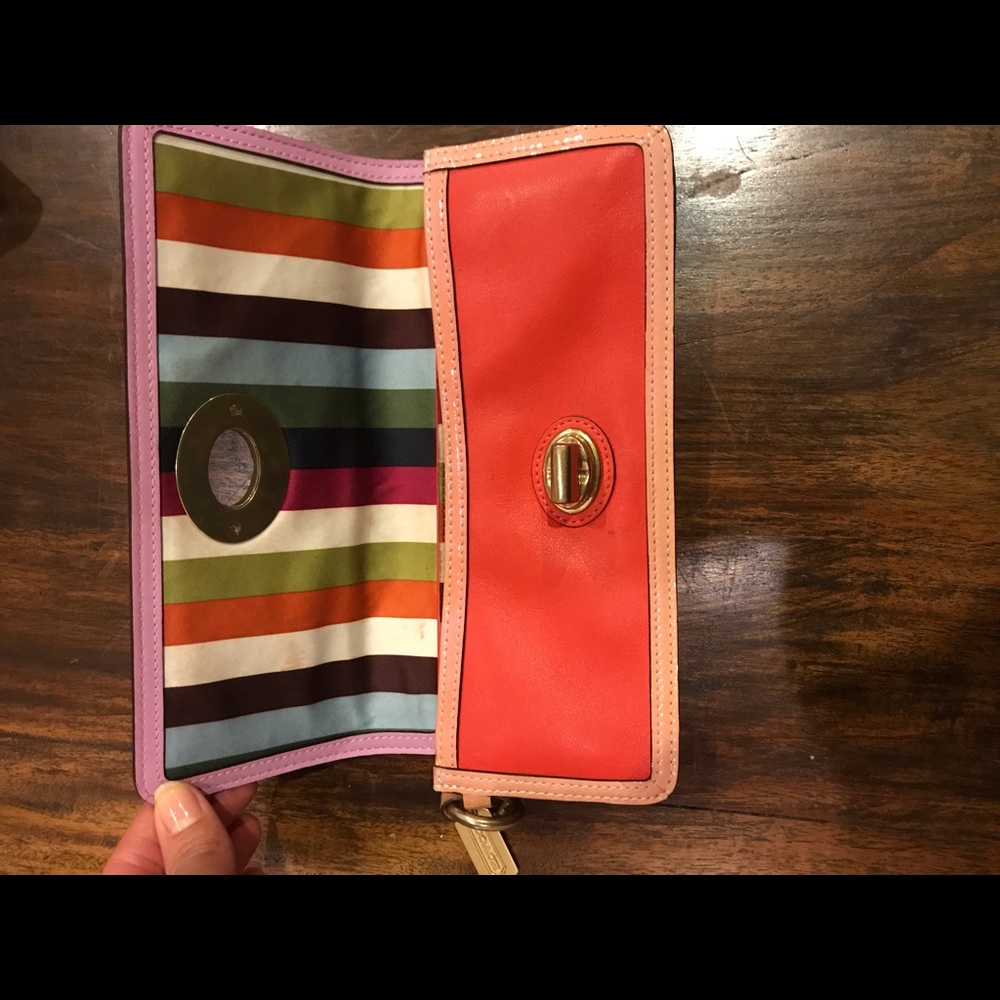 Coach legacy leather clutch with patent trim